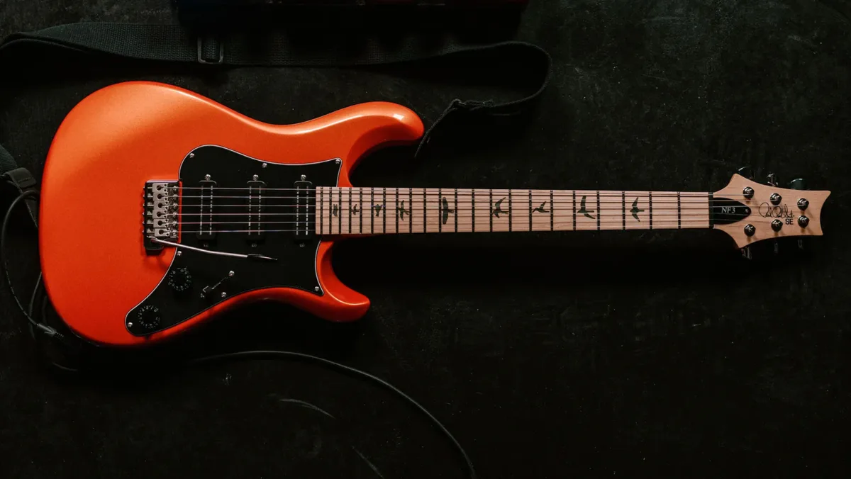 PRS SE NF3: Metallic Orange, triple humbuckers